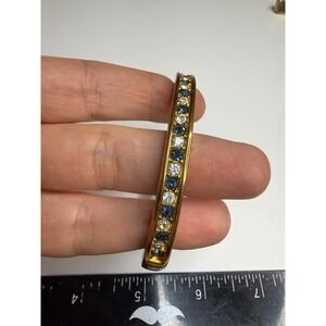 Roman Gold Tone Blue Clear Rhinestone Channel Set Hinged Bangle Bracelet
